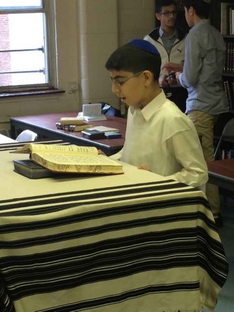 student practicing to become a chazan